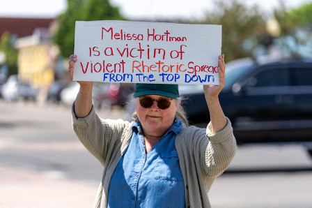 A_protester_holds_a_sign_at_the__No_Kings__protest_in_Bemidji_referencing_Rep._Melissa_Hortman's_killing_early_Saturday_morning_on_June_14,_2025._The__No_Kings__protest_was_held_in_the_afternoon_of_the_same_day._(54589555381).jpg, sept. 2025
